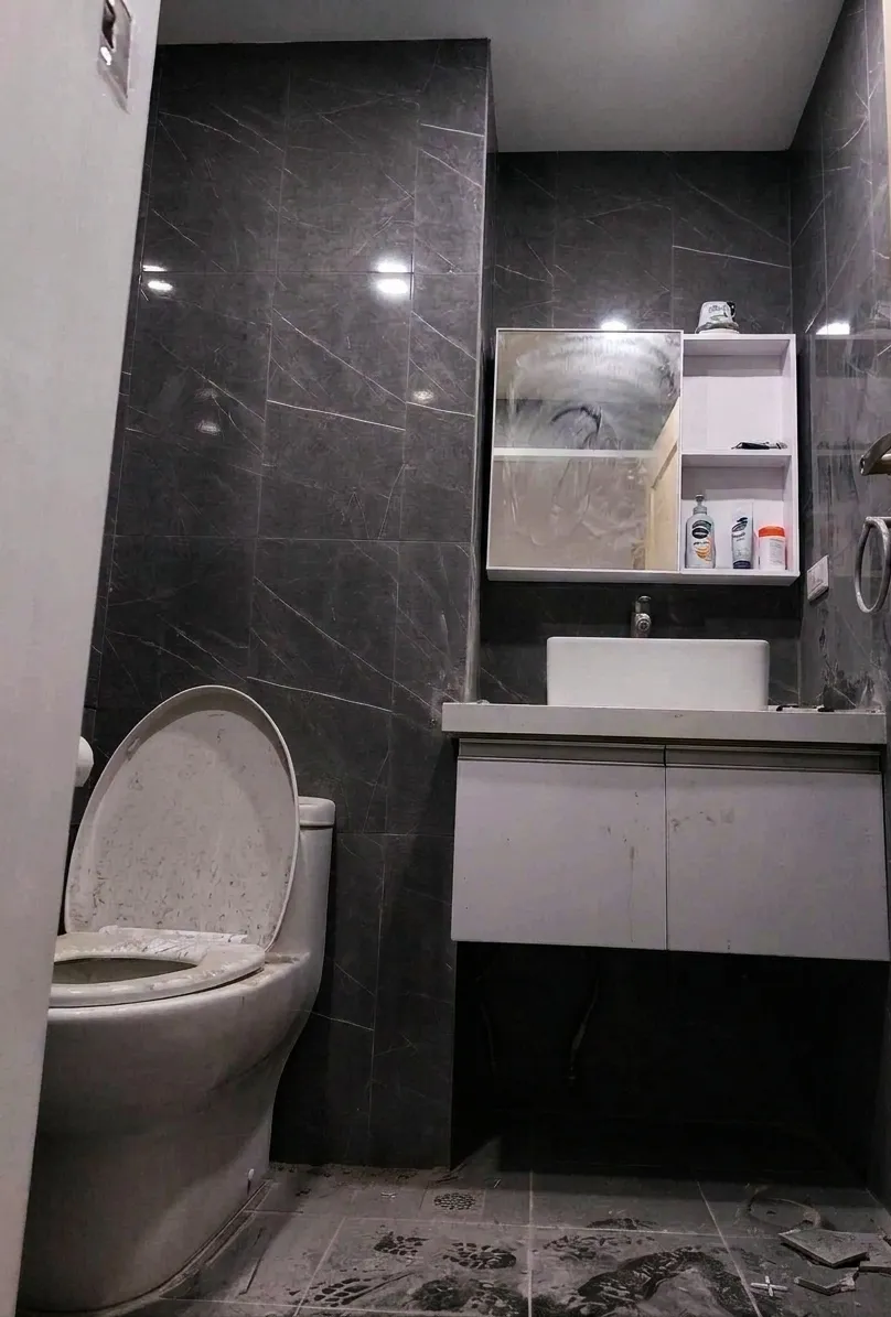 Bathroom with soap stains and grime buildup before Total Cleaning Manila deep cleaning