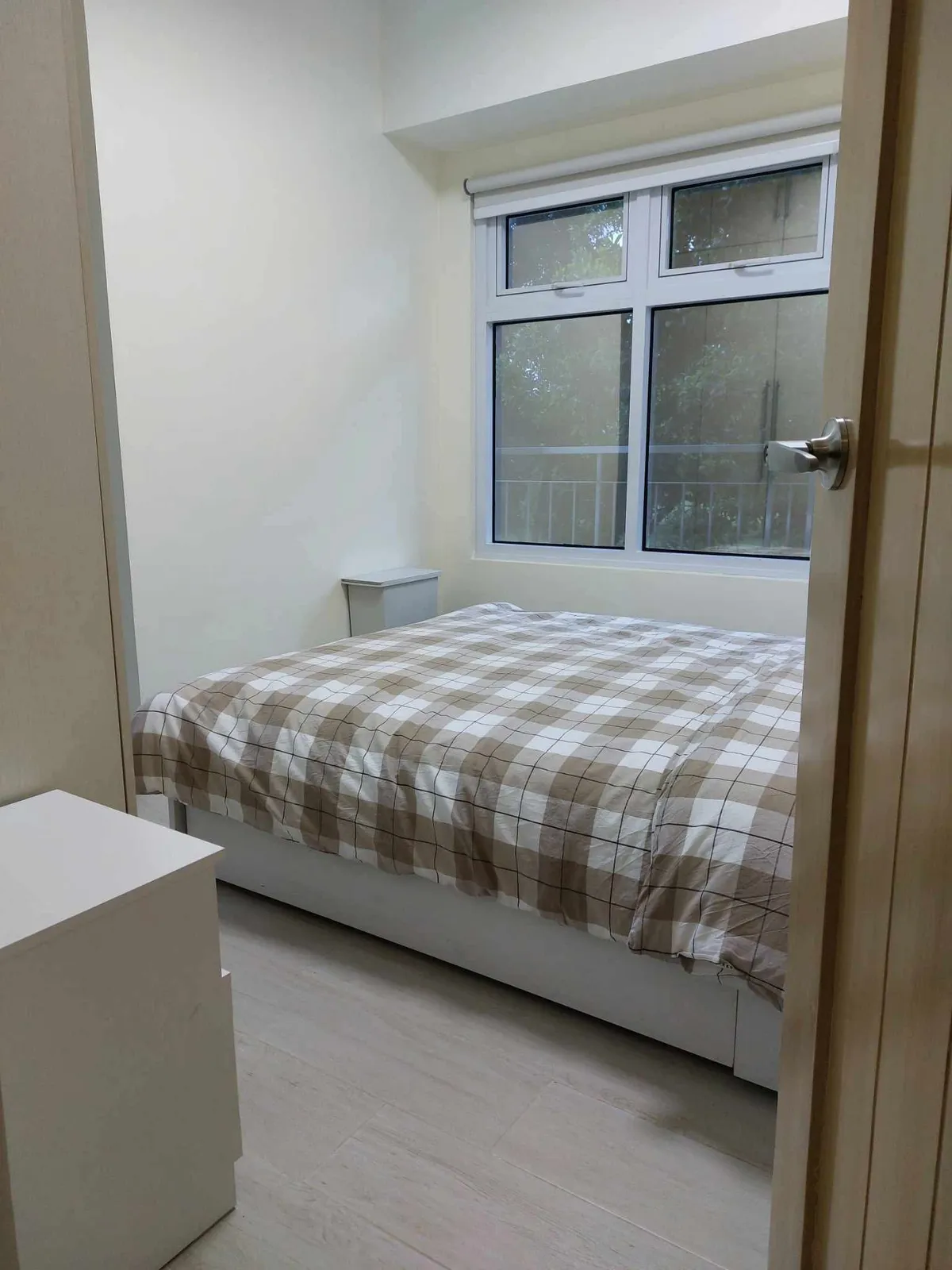 Bedroom freshly cleaned and organized after Total Cleaning Manila surface cleaning