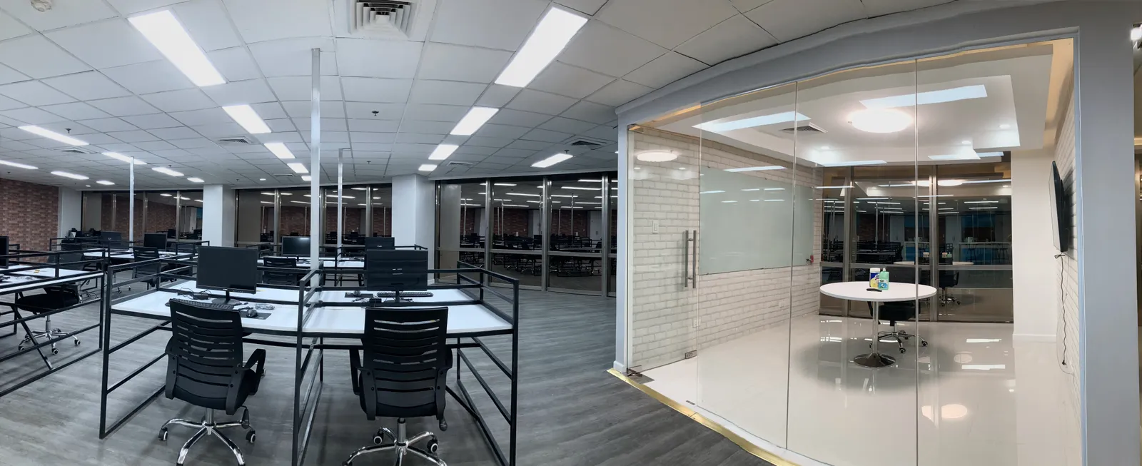 Wide-angle view of post-construction cleaning work in progress