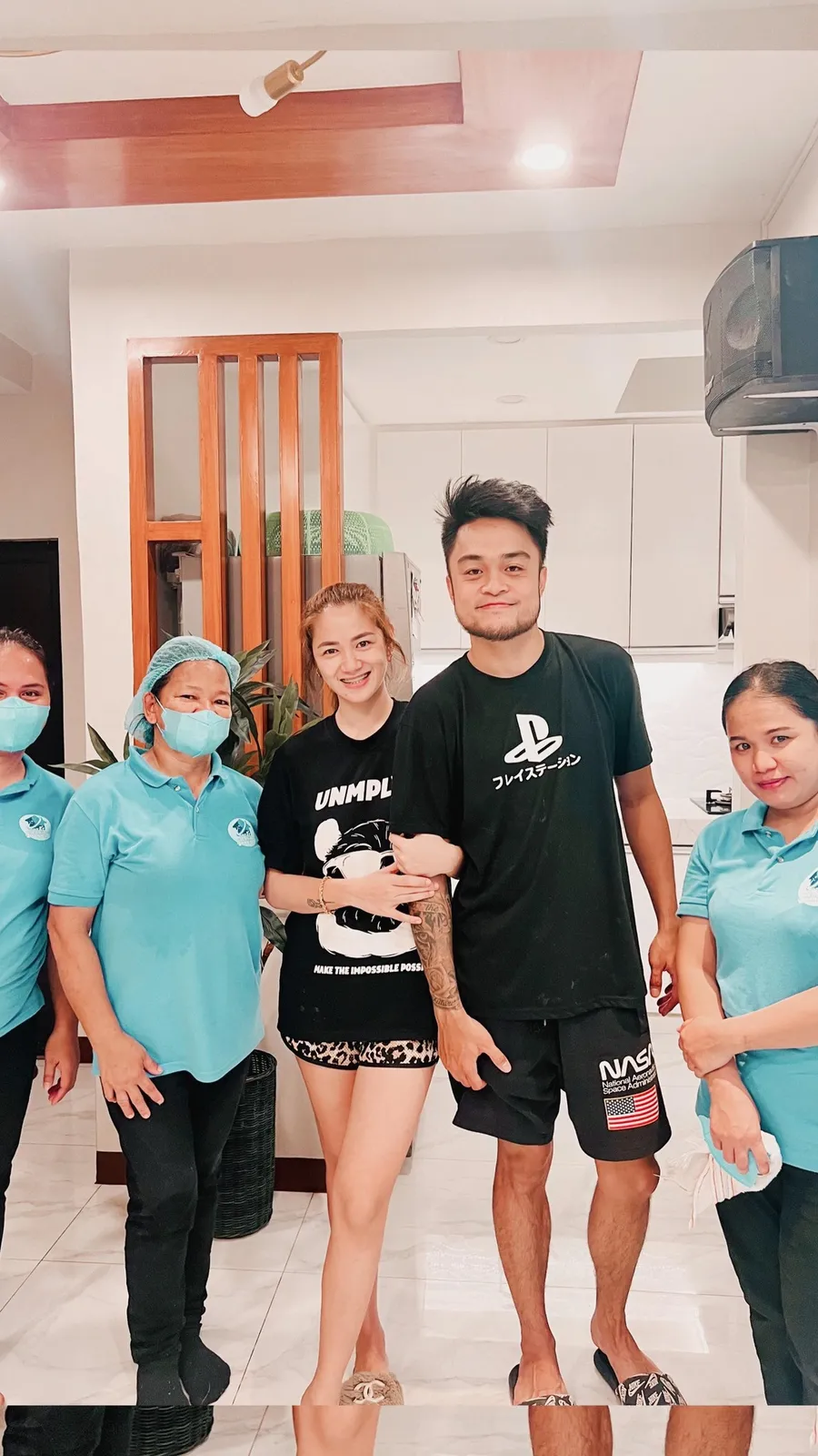 Cleaning team meeting with client at the conclusion of a Metro Manila service call